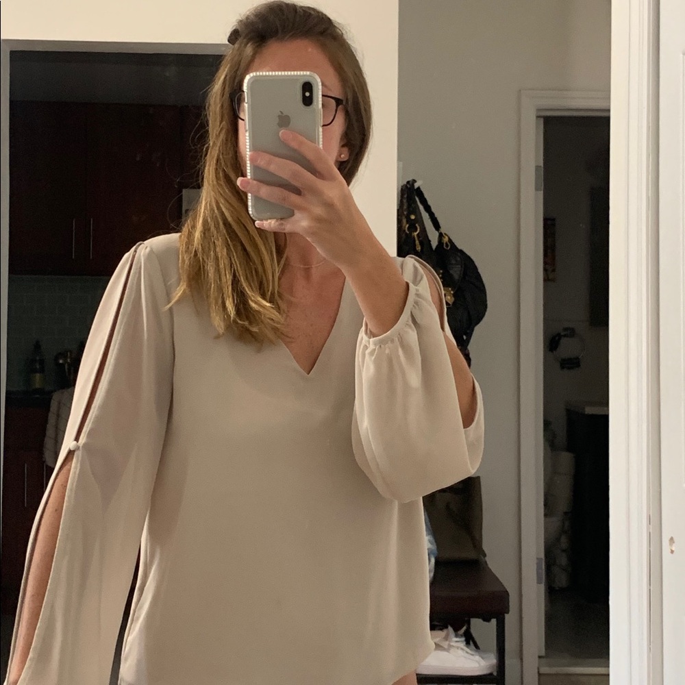 Long sleeve cut out sheer blouse
